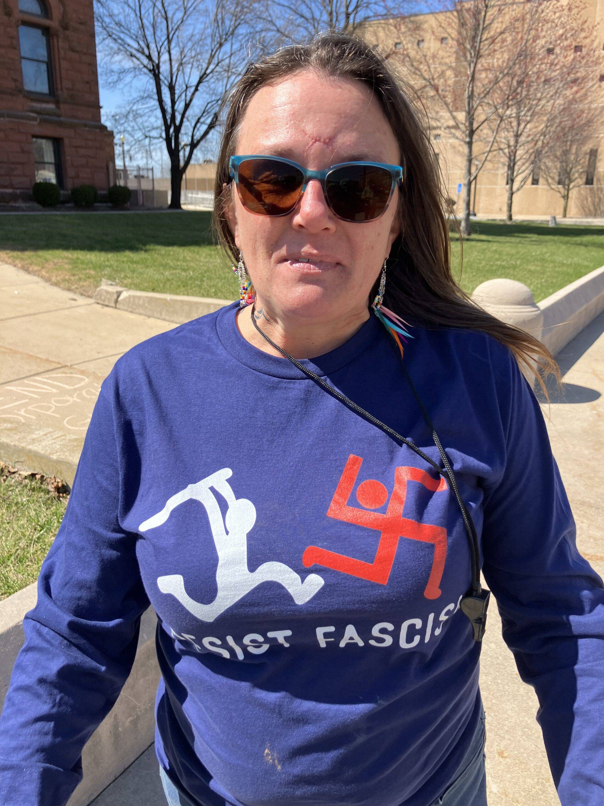 resist fascism patriot bashing swastika